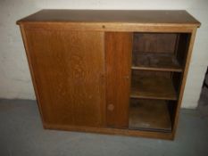 A RETRO SCHOOL TYPE STORAGE CABINET UNIT WITH ADJUSTABLE SHELVES