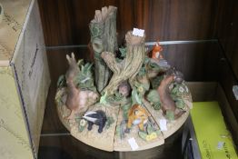 A WOODLAND LIFE FIGURE GROUP