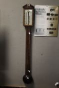A STICK BAROMETER WITH NAME 
