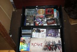 TWO TRAYS OF CDS AND DVDS