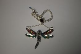 A SILVER PLIQUE-A-JOUR DAMSEL FLY NECKLACE SET WITH PERIDOT GARNETS, RUBIES AND MARCASITES