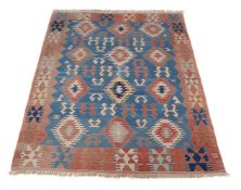 A Kilim rug or throw