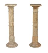 A pair of Italian alabaster pedestals