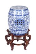 A Minton's blue and white printed pottery garden seat in the Chinese manner