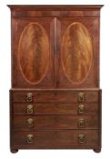 A Regency mahogany and line inlaid linen press