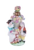 A Charles Gouyn St. James's factory type scent bottle and stopper modelled with children about a bas