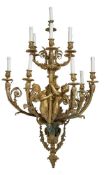 A pair of substantial gilt bronze eleven light wall appliques