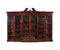 A George III style mahogany double breakfront bookcase