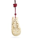 ϒ A Chinese pierced ivory double gourd ivory pomander, Qing Dynasty, 19th century