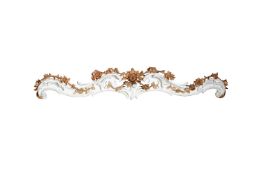 A pair of Victorian white and ivory painted carved pelmets, mid-19th century