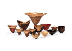 λ Bert Marsh (British, 1932-2011), a collection of thirteen various turned wood vessels