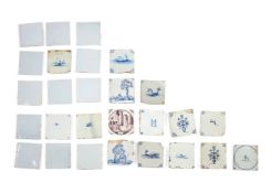A selection of approximately twenty-six Delft tiles, 18th & 19th centuries