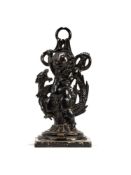 A Victorian black painted cast iron door porter