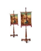 A pair of Victorian mahogany pole screens, circa 1850