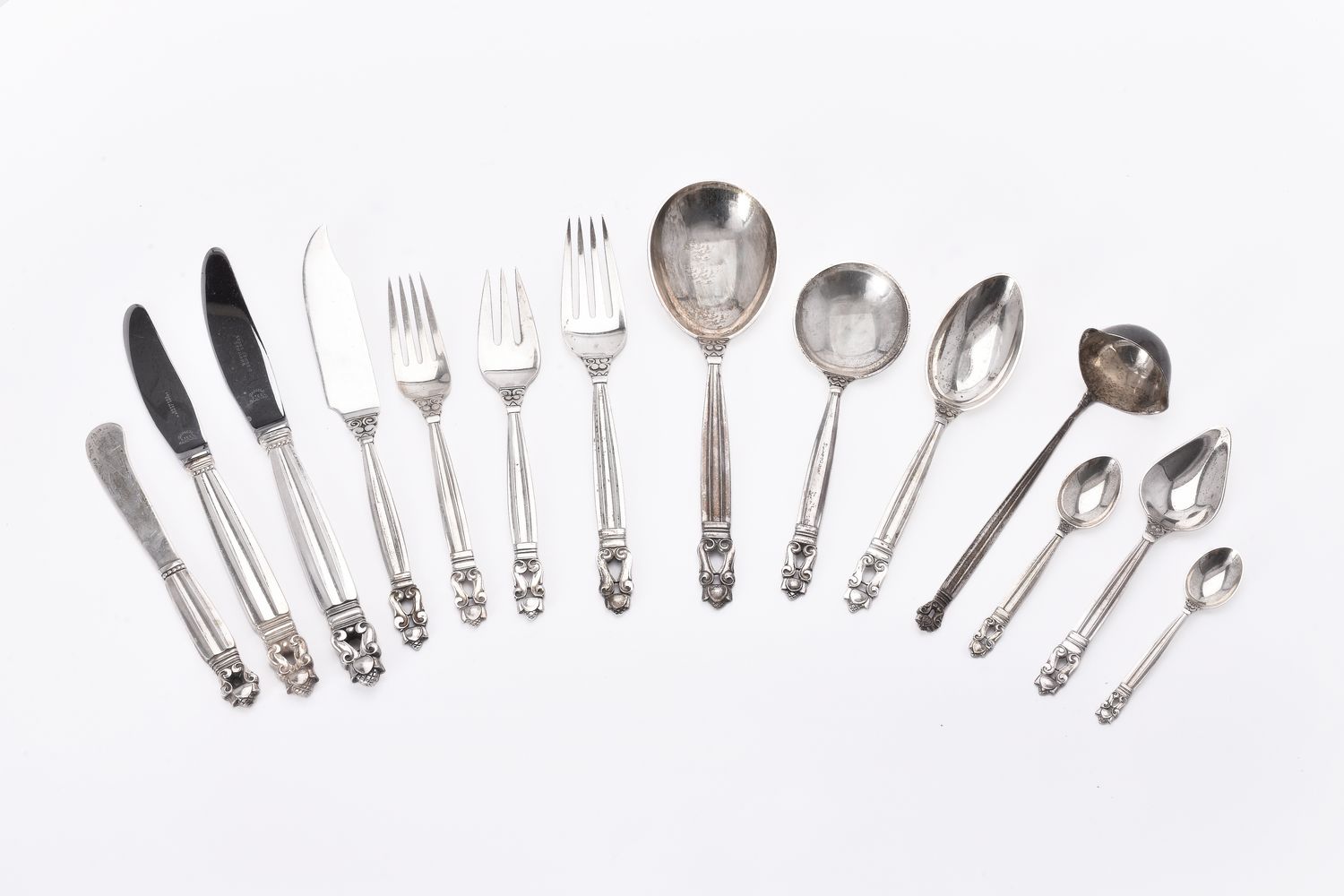 Johan Rhode for Georg Jensen Solvsmedie A/S, a Danish silver Acorn pattern table service for twelve