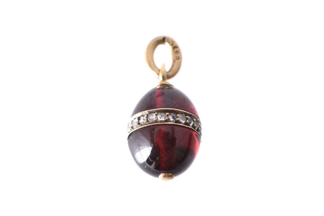 A late 19th century Russian garnet and diamond egg pendant by Karl Bok
