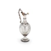 A Victorian silver ovoid pedestal claret jug by Charles Boyton II