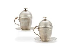 A pair of Ottoman silver parcel gilt sahlep cups, covers and stands