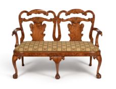A walnut chair back settee, in George II style, 19th century