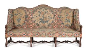 † A French walnut and needlework upholstered settee, 18th century and later elements