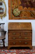 A George I oak, pollard oak and feather banded bureau, circa 1720