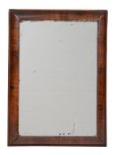 A William III walnut cushion framed wall mirror, circa 1695
