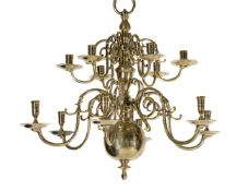 A companion pair of Dutch or English brass twelve light chandeliers, 18th century