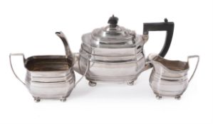 A silver shaped oblong baluster tea set by S. Blanckensee & Son Ltd.
