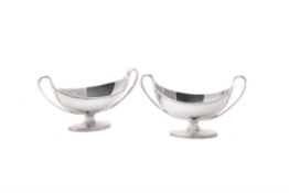 A pair of George III silver navette salts by Henry Chawner