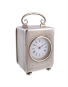 An Edwardian silver carriage clock by John Pound & Co.