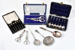 A collection of silver flatware