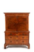 A Queen Anne walnut and feather banded escritoire, circa 1710