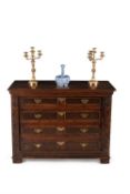 An unusual carved oak chest of drawers, mid 17th century
