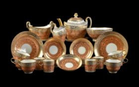 A Worcester (Flight & Barr) salmon-pink and gilt part tea service