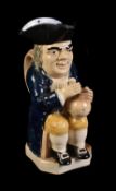 A Staffordshire creamware Toby jug