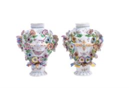 Two similar Bow frill vases