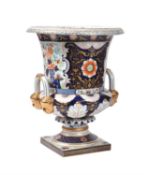 A modern far Eastern porcelain Imari pattern campagna urn in the early 19th century Derby manner