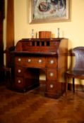 An mahogany cylinder desk
