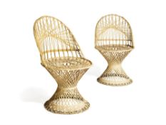A pair of white painted wicker side chairs