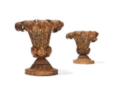 A pair of Italian gilt and pressed metal and composition vases