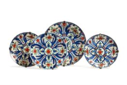 Four various Dutch Delft polychrome plates