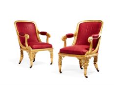 A pair of Gothic Revival cream painted salon chairs