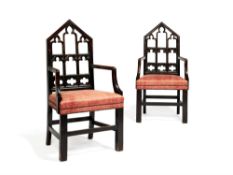 A pair of George III stained oak armchairs in Gothic taste