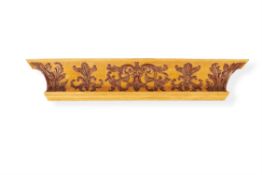 A Continental yellow painted wood and composition architectural element