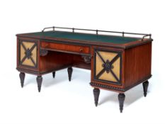 A German walnut and ebonised desk