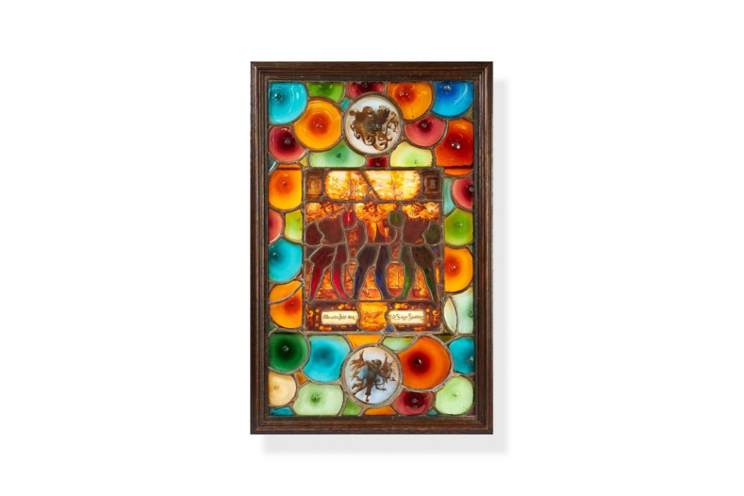 A Swiss stained and leaded glass figural panel