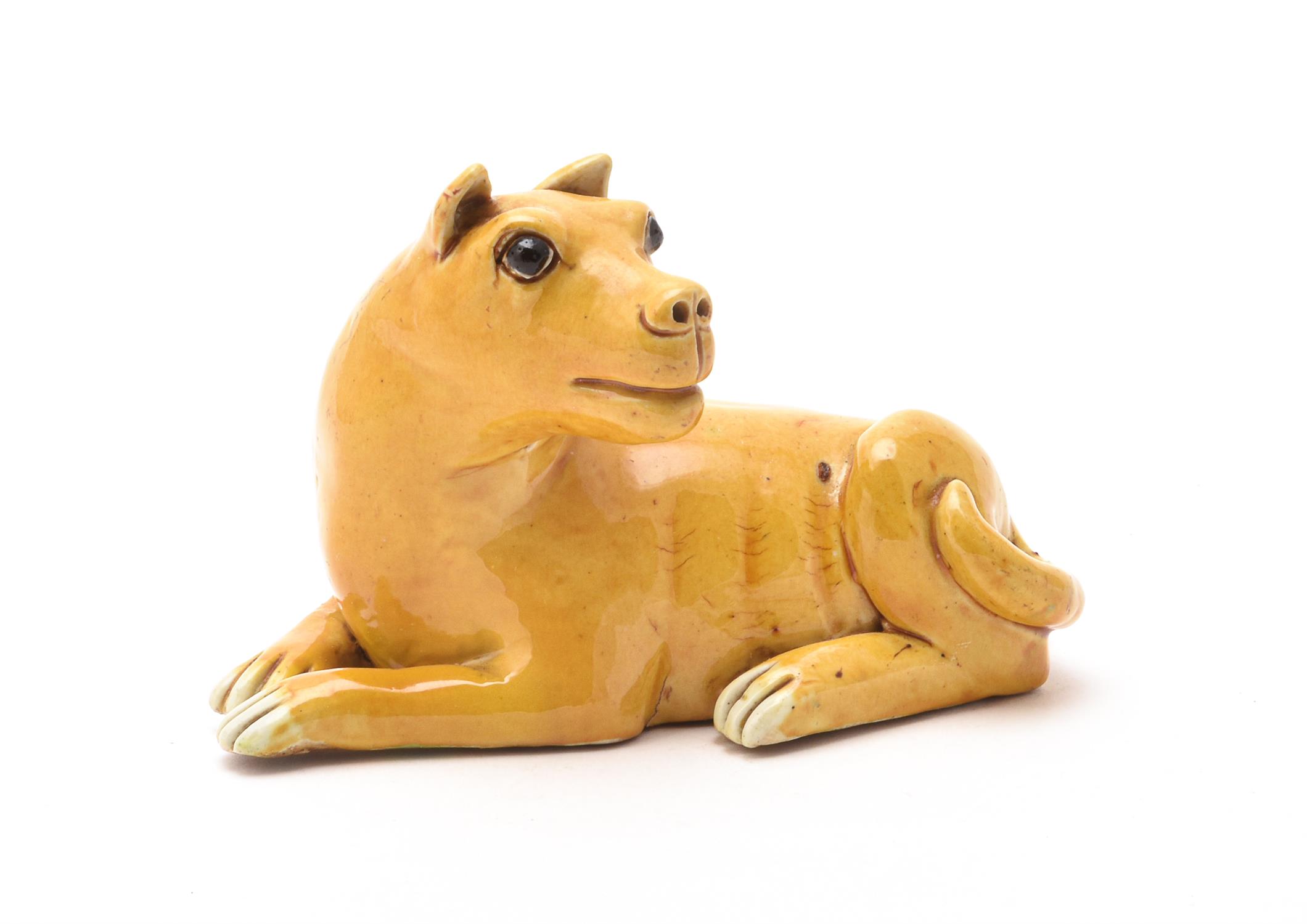 A Chinese export yellow-glazed model of a dog