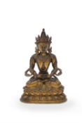 A Sino-Tibetan gilt-bronze figure of Buddha Amitayus