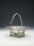 A George III silver swing handled basket by William Plummer