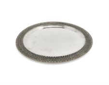 A silver parcel gilt circular salver by Stuart Devlin